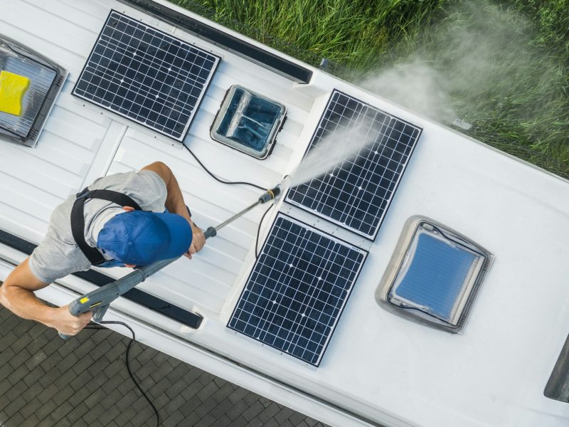 Men Power Washing His Camper Van RV Roof and Solar Panels